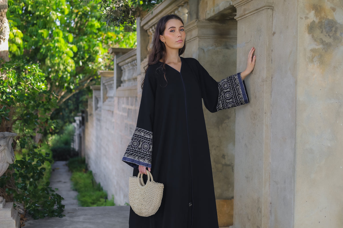 Woman in black abaya