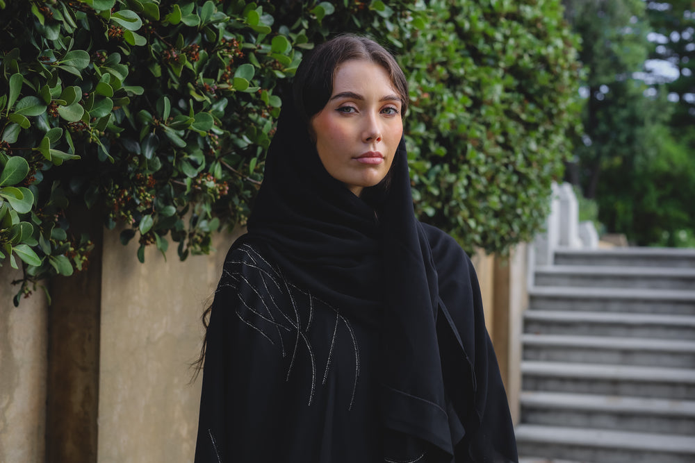 Woman in black abaya